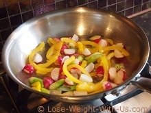 Frying the Peppers, Radishes and Spring Onion